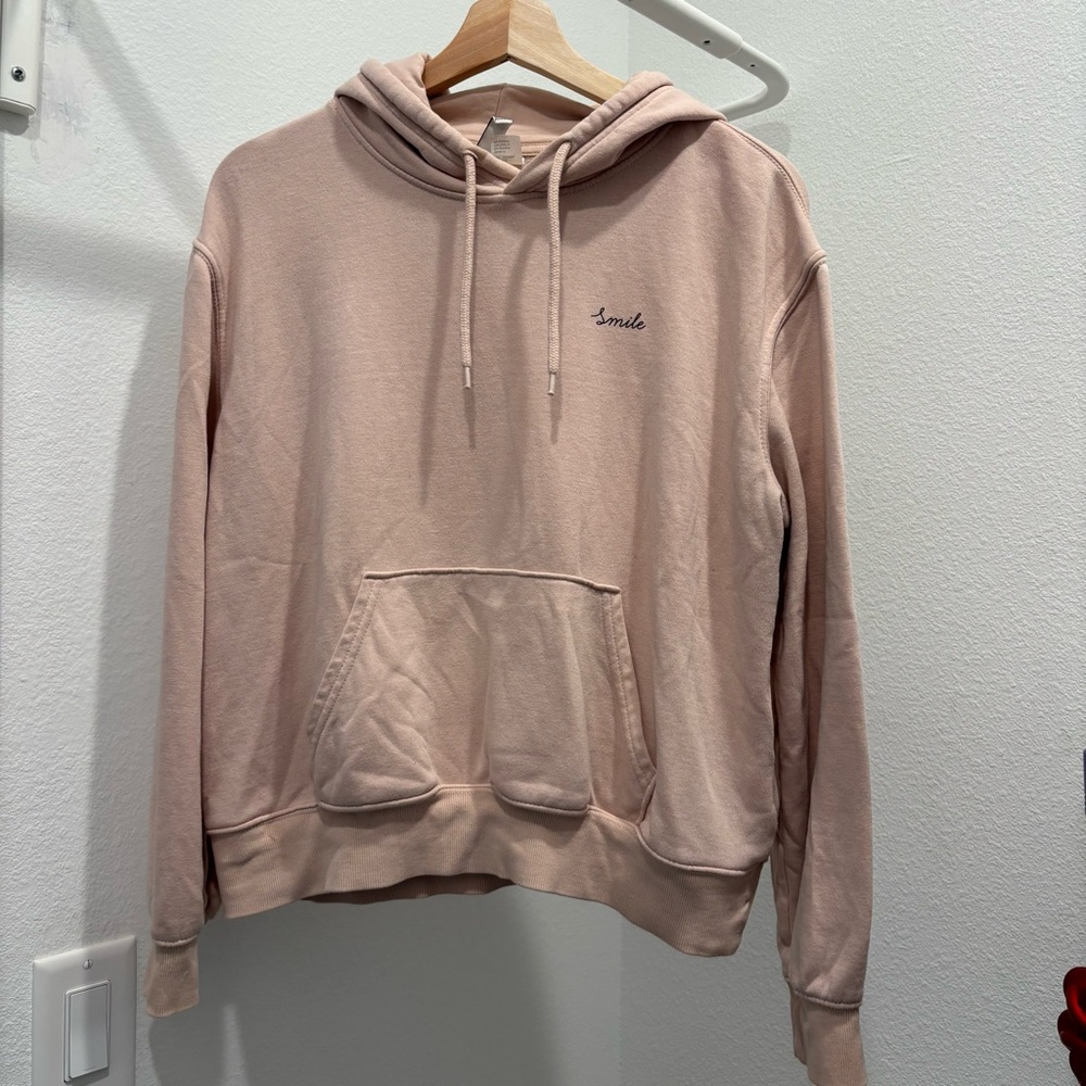 Pink Hoodie with 'Smile' Text